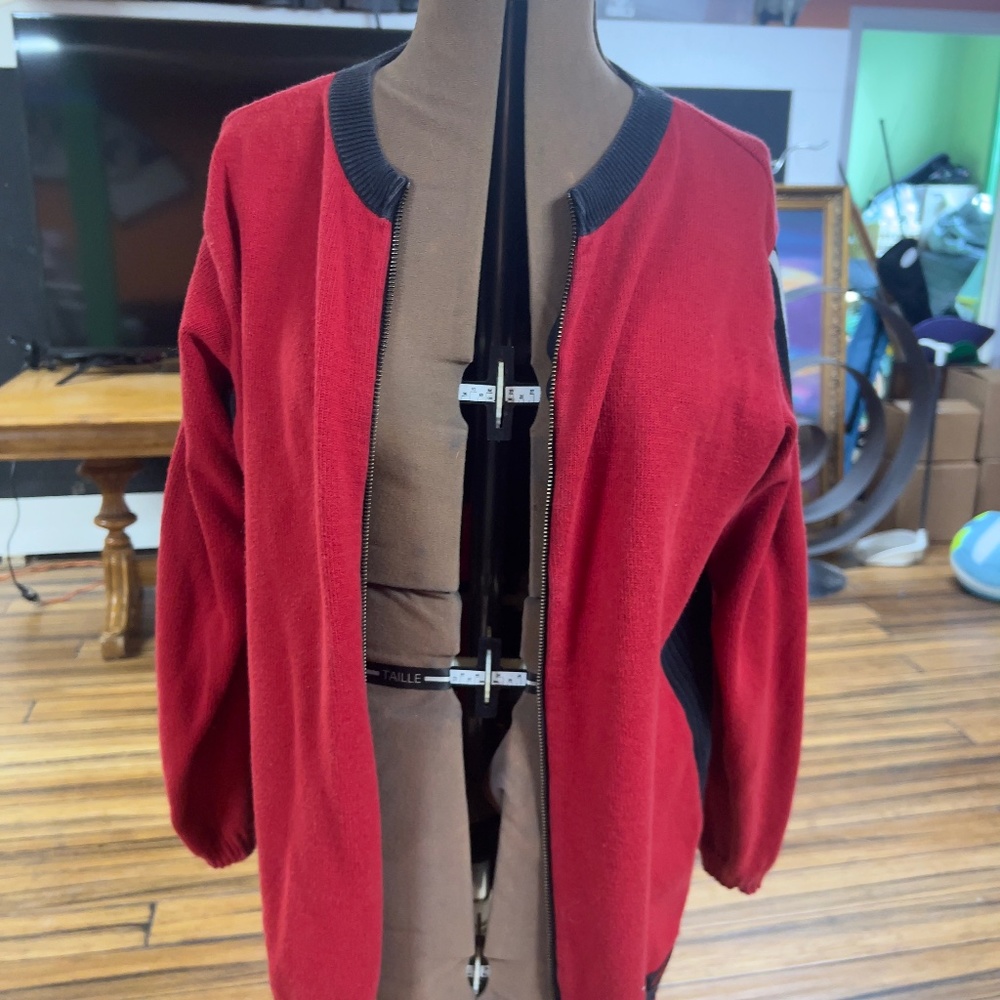 Red Cardigan with Black and White Striped Sleeves